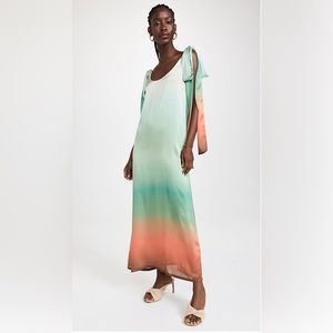 Fe Noel Bowtie Occassion Dress
Caribbean Horizon Print, Brand new with tags!!